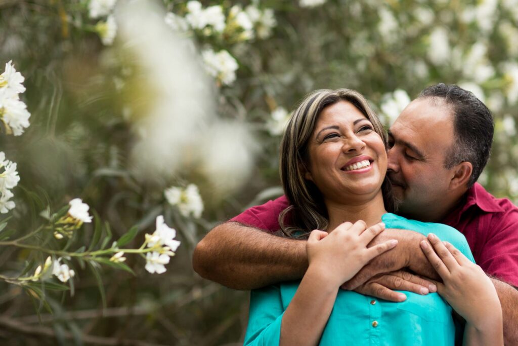 Photo of a couple hugging outside
