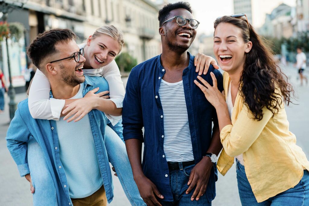 Photo of friends having fun outdoors in the city