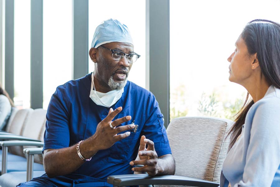 Photo of a woman talking to her doctor